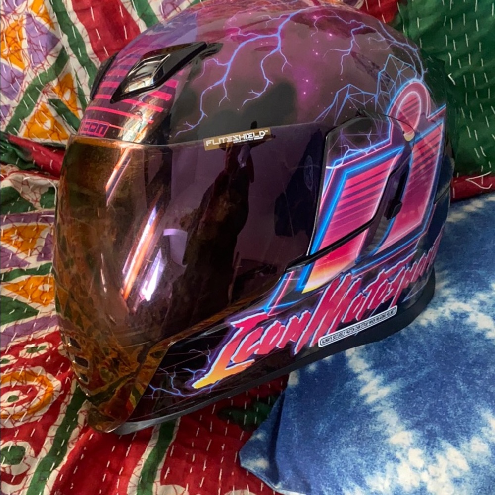 Icon motorcycle helmet pink blue
